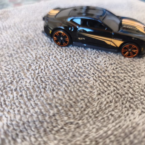 Land Rover Defender and Cord Camaro toy cars, set of 2
