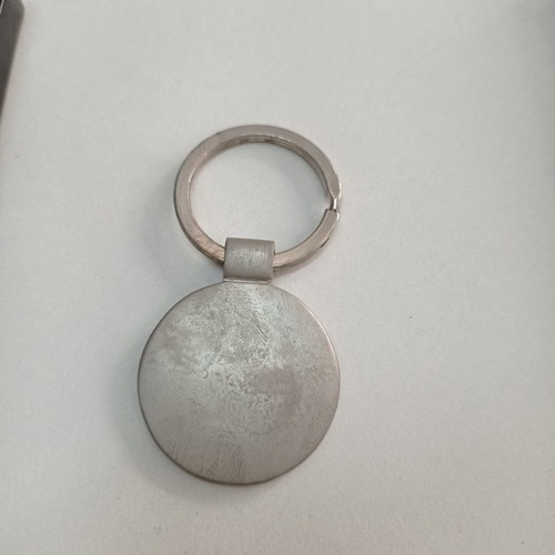 Citroen metal keychain silver with case in fair condition