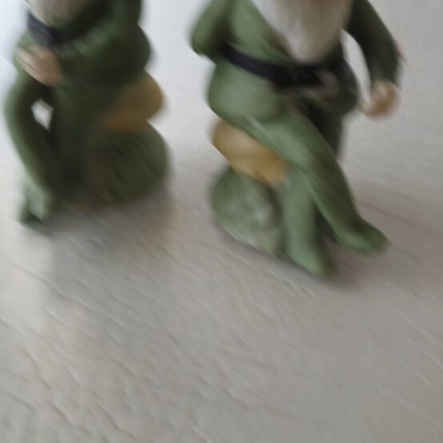 Porcelain figurines of dwarves used, set of two