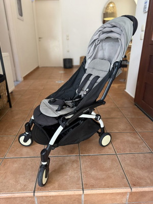 Babyzen YOYO stroller used with rain cover and winter footmuff