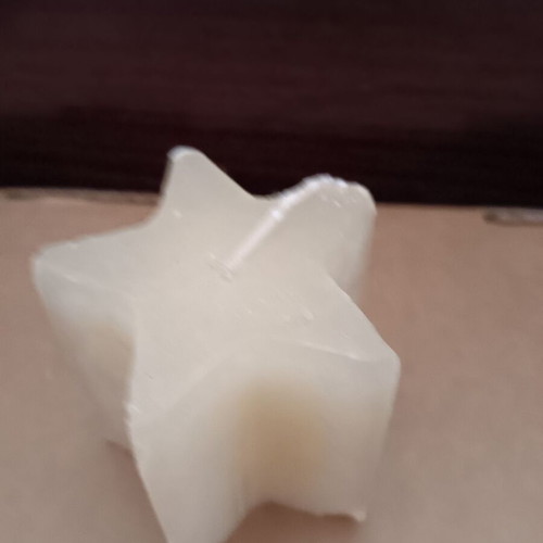 Star-shaped candle used, good condition