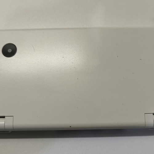 Nintendo DSi white console with 10 games and stylus used