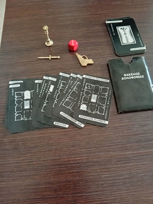 Cluedo 1980s game contents used, includes cards, dice, and murder folder