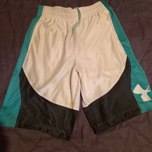 Under Armour men's athletic shorts used, size Medium, black and white