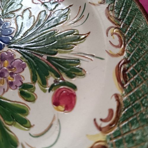 Decorative ceramic plate with hand-engraved floral motif, like new