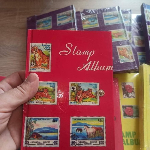 Stamp album new, 8 leaves, 16 pages