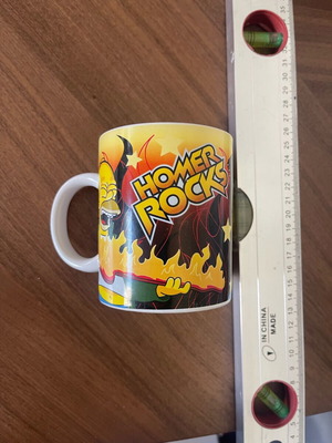 Simpson collectible mug used with Homer Rocks design