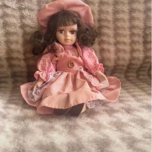Porcelain doll vintage like new, about 20cm