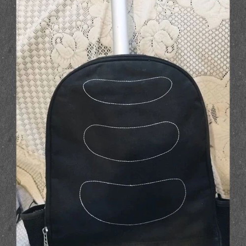 No Fear school bag used with three large compartments