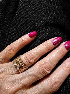 Guess women's ring like new, gold tone with pink zircon stones
