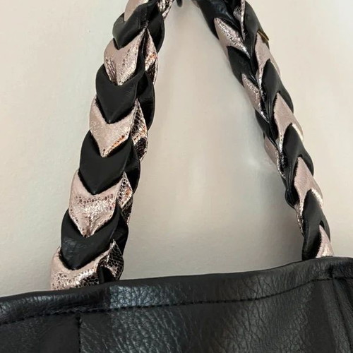 Black shoulder bag tote style like new with inner pockets and silver handle detail