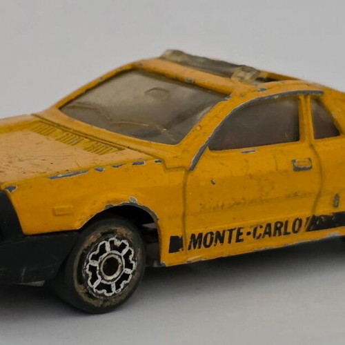 Majorette Lancia Monte Carlo toy car yellow 1980s #285