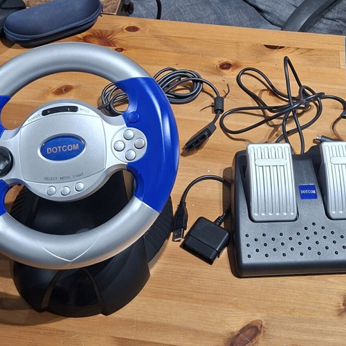 Racing Wheel Dotcom like new for PlayStation 1 and 2 with pedals and box