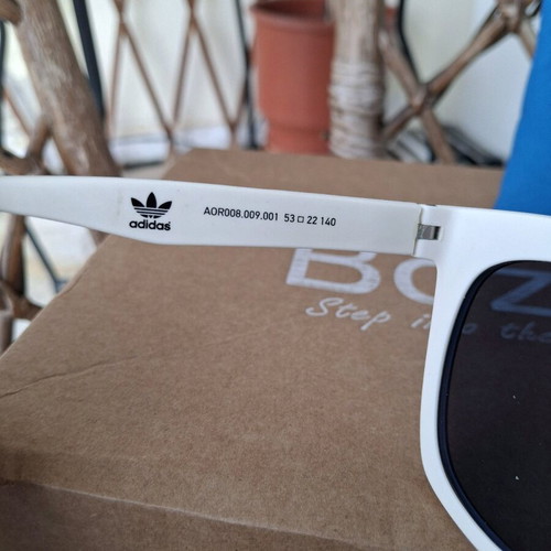 Adidas sunglasses used, black matte with blue mirror lens