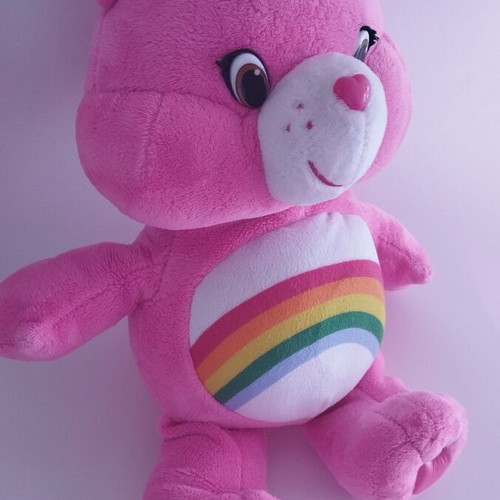 Care Bear Love Bear used, talks and laughs