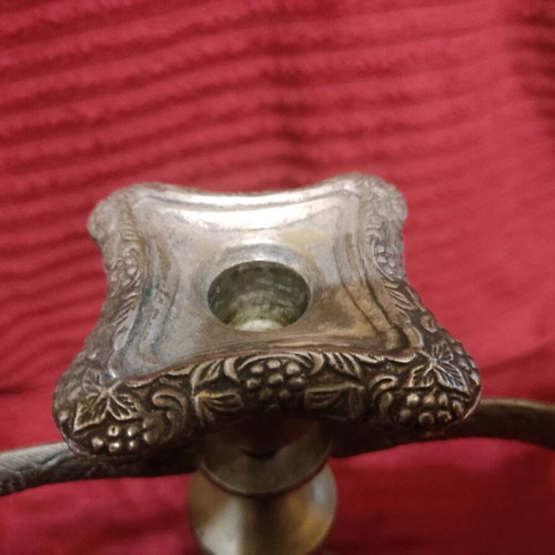 Metal triple candlestick used, ornate and heavy