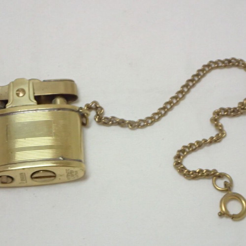 Vintage Penguin K Automatic Lighter made of brass, like new