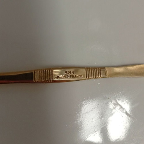 French vintage tweezers used, likely gold-plated from Nogent