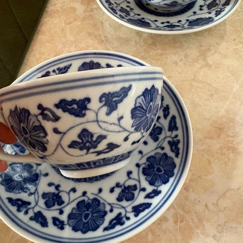 Chinese porcelain tea cups with saucers, white and blue decoration