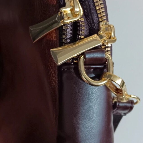 Crossbody bag brown new with unique design