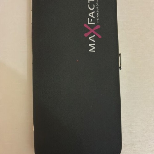 Max Factor nail care set with scissors, clippers, file, tweezers, cuticle tool