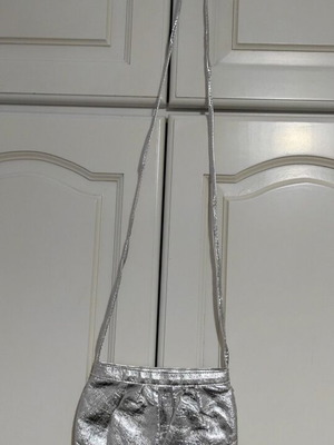Silver small bag like new, handheld and crossbody