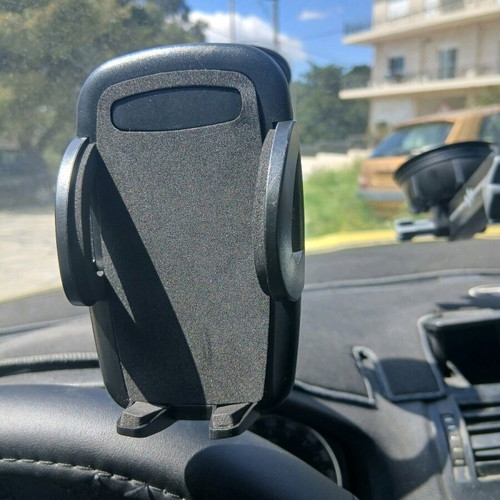 Mobile phone holder with flexible arm and clip for windshield or dashboard