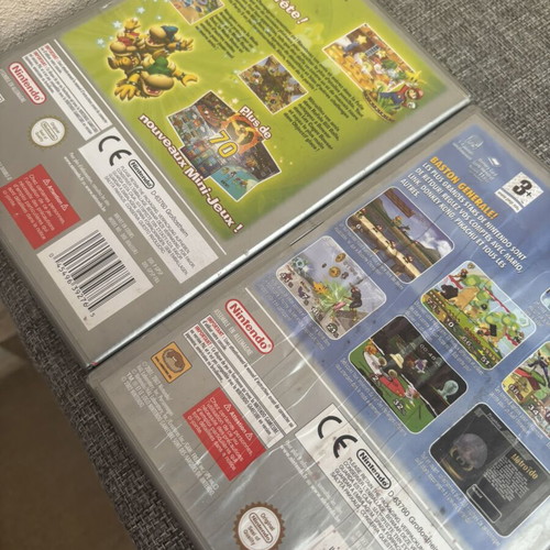 GameCube empty cases with Mario manual