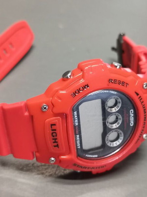 Vintage Casio Illuminator W-214HC wrist watch used, red