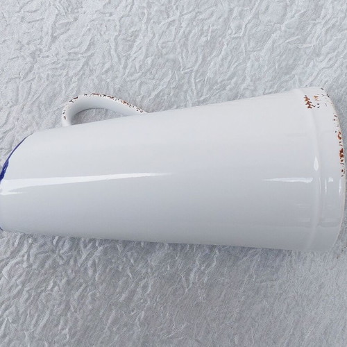 Ceramic jug like new resembling oxidized tin vessel