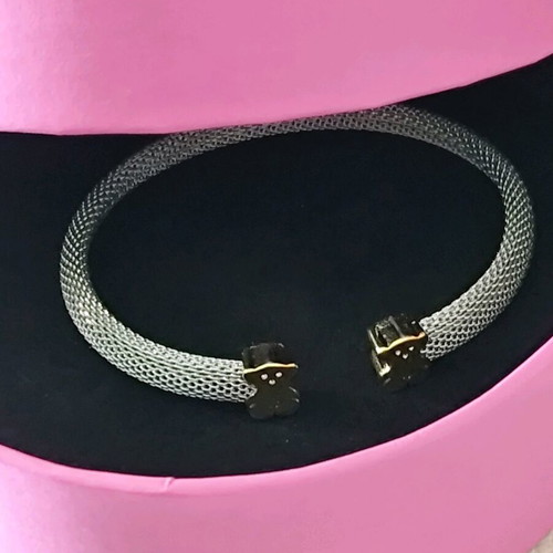 Tous bracelet with gold 750 and stainless steel in new condition