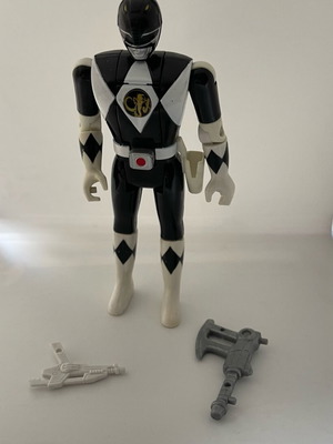 Black Power Ranger with his weapons used