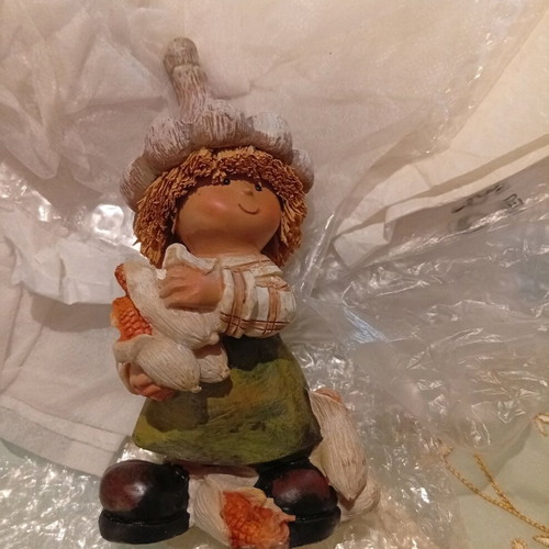 Royal Art Collection ceramic decoration new with child and garlic hat