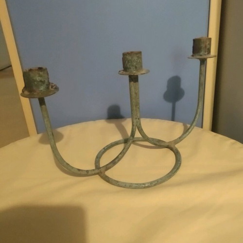 Vintage three-arm candlestick made of patinated brass like new