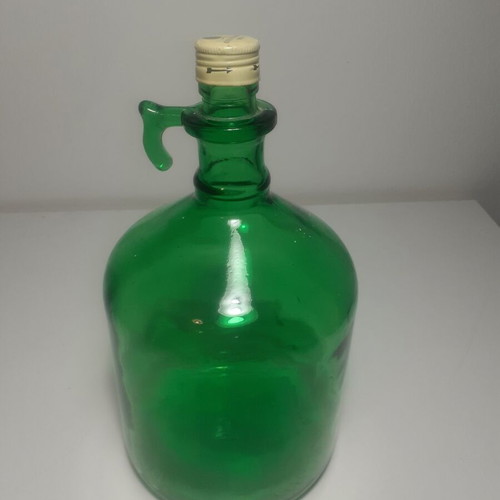 Boutatis bottle vintage glass used