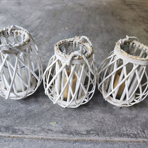 Set of 6 white rattan lanterns with glass candle holders used