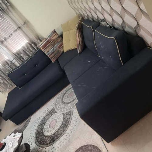 Corner sofa blue with pillows like new