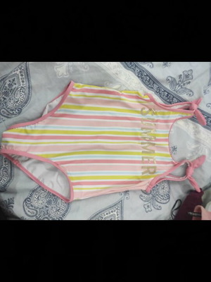 Orchestra children's swimsuit multicolored like new, age 10