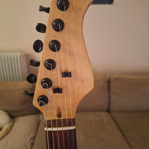 Stratocaster-style electric guitar, Cherry Sunburst finish