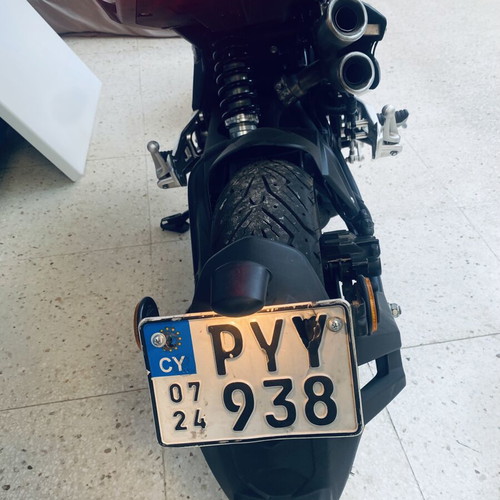 Benelli BN 125 naked bike, grey/black with yellow accents