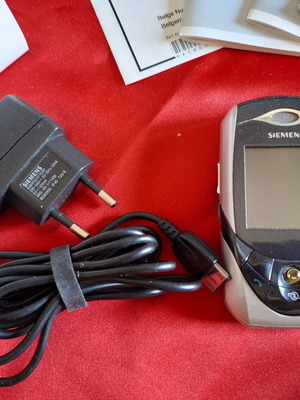Siemens SL65 Ebony collectible cell phone used with packaging and accessories