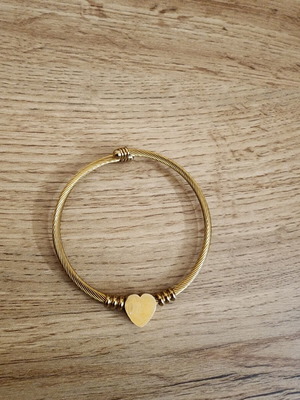 Gold toned stainless steel twisted cable wire cuff bracelet like new