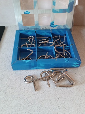 Metal puzzles used, set of 6+2 pieces