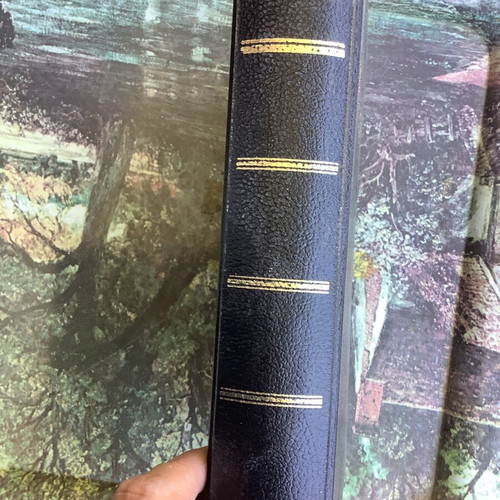 Leather-bound book Apostle Paul used, author Holzner