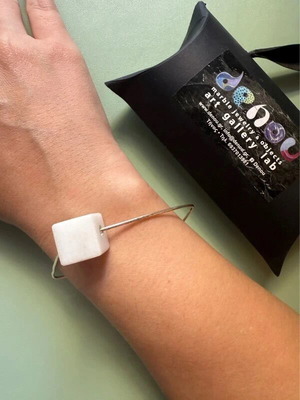 Handmade bracelet used with Tinos marble and metal