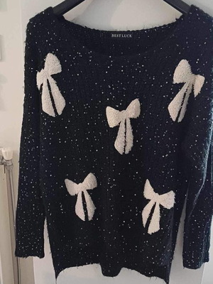 Knitted sweater used, black with silver sequins