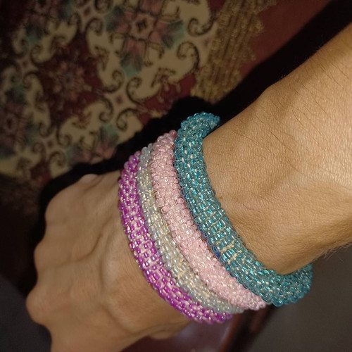 Bracelets new, set of 4 in various colors
