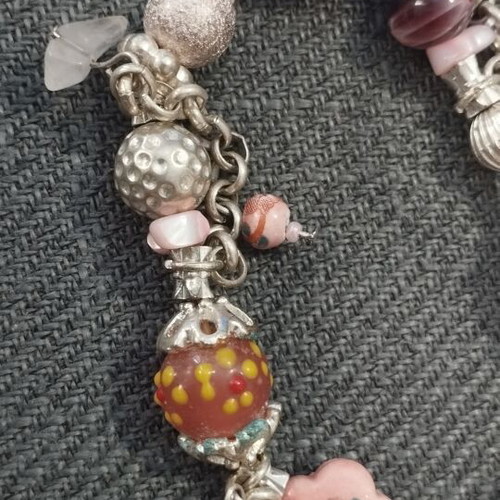 Women's bracelet with charms and pink beads like new