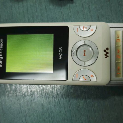 Sony Ericsson W205 Walkman used, white with original charger