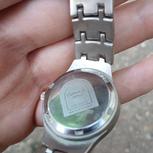 Omax Quartz Model HB 0239 watch like new, silver unisex